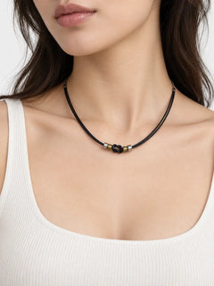 Black Knot Leather Cord Necklace with Vintage Metal Accents